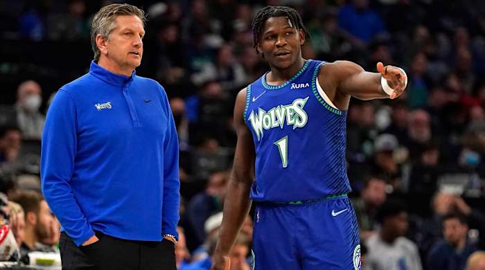Apr 10, 2022; Minneapolis, Minnesota, USA; Minnesota Timberwolves head coach Chris Finch and guard Anthony Edwards (1) discus the previous play against the Chicago Bulls during the second quarter at Target Center.